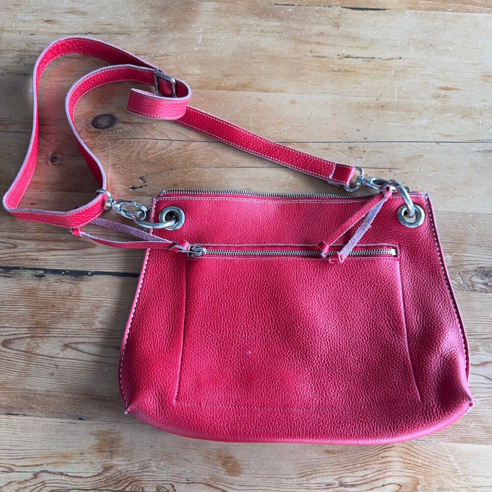 Vintage red Roots crossbody bag